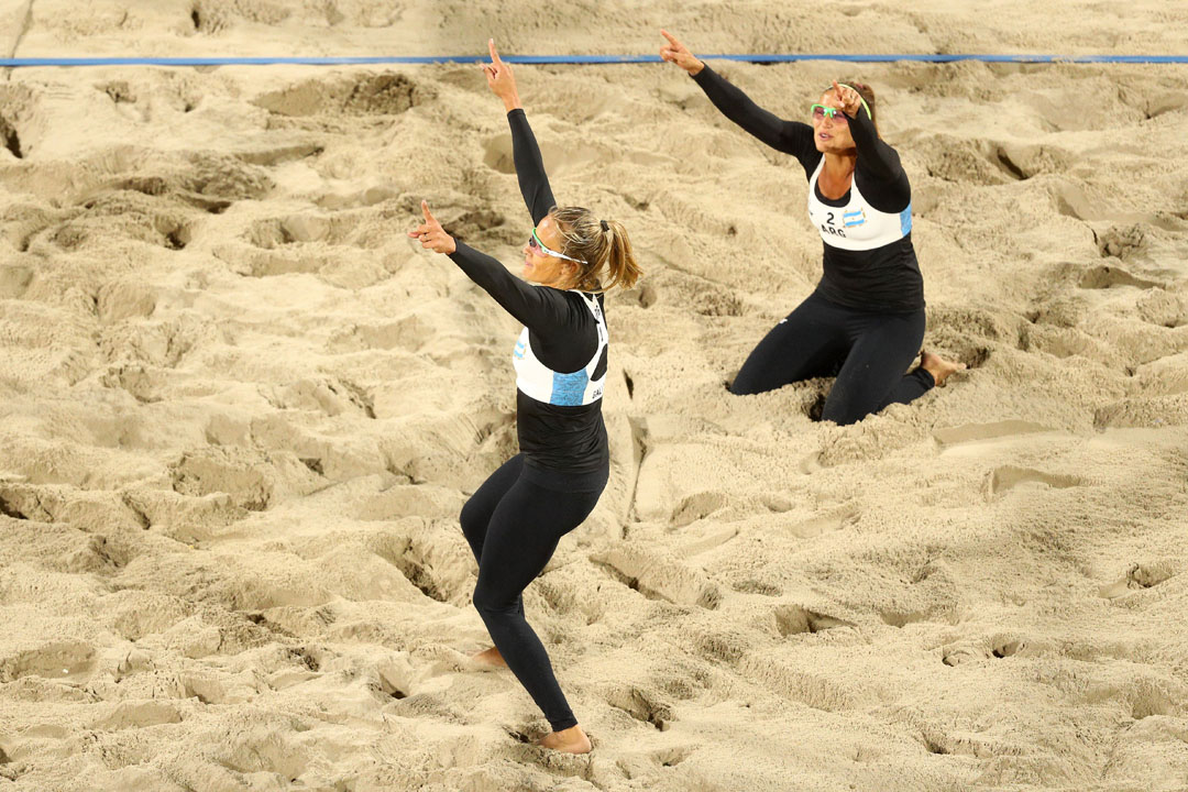 RIO DE JANEIRO, BRAZIL - AUGUST 10: Ana Gallay and Georgina Klug of Argentina celebrate winning a point against Barbora Hermannova and Marketa Slukova of Czech Republic during the Beach Volleyball - Women's Preliminary - Pool B, Match 26 on Day 5 of the Rio 2016 Olympic Games at the Beach Volleyball Arena on August 10, 2016 in Rio de Janeiro, Brazil. (Photo by Paul Gilham/Getty Images)