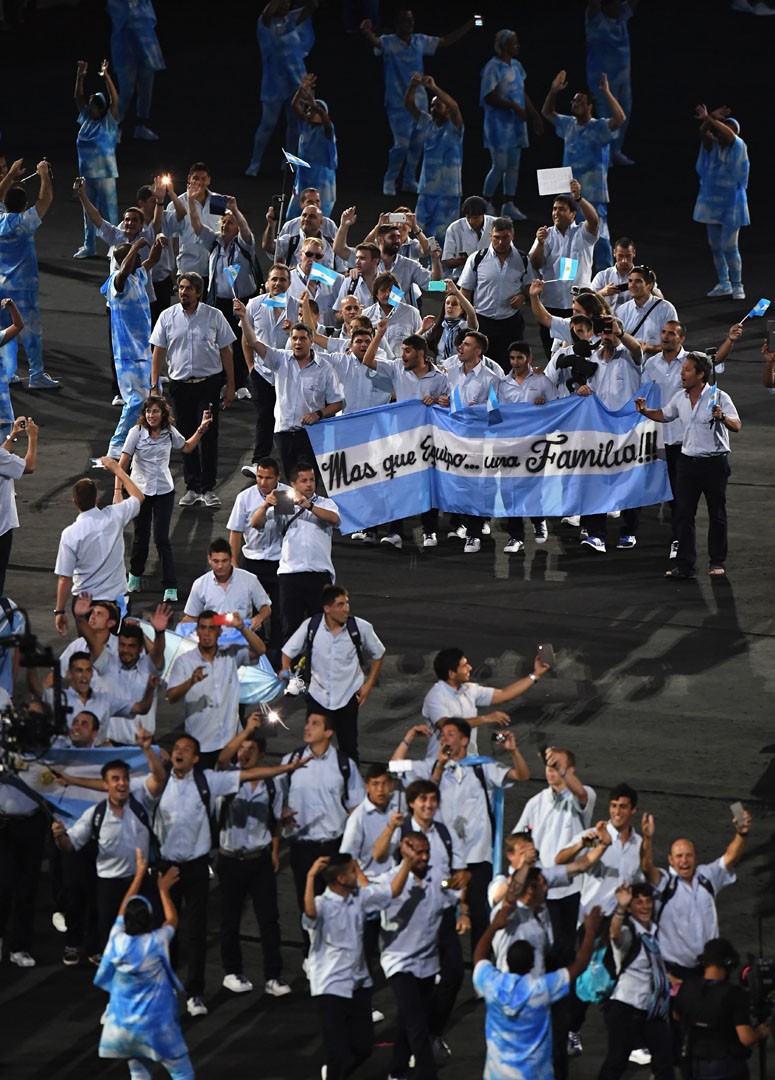 RIO DE JANEIRO, BRAZIL - SEPTEMBER 07: Flag bearer Gustavo Fernandez of Argentina leads the team entering the stadium during the Opening Ceremony of the Rio 2016 Paralympic Games at Maracana Stadium on September 7, 2016 in Rio de Janeiro, Brazil. (Photo by Atsushi Tomura/Getty Images)